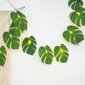 Hojas de monstera artificiales con tacto real de 118" x 6" para bodas y eventos - Verde